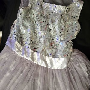 Juniors formal dress. Grey and sequence and mesh skirt bottom. Its Size small